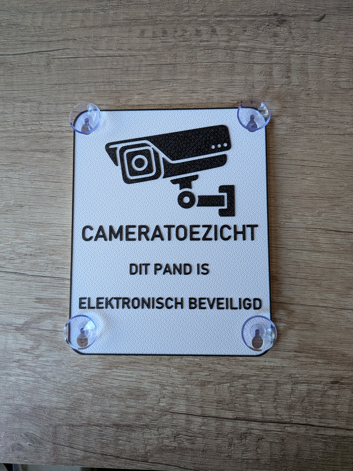 Cameratoezicht Bord Raam